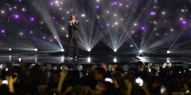 Cyprus' John Karayiannis performs the song 'One Thing I Should Have Done' during a dress rehearsal for the second semifinal of the Eurovision Song Contest in Austria's capital Vienna, Wednesday, May 20, 2015. (AP Photo/Kerstin Joensson)