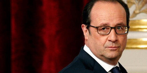French President Francois Hollande arrives for a press conference with U.N. Secretary-General Ban Ki-moon, at the Elysee Palace in Paris, France, Wednesday, April 29, 2015. (AP Photo/Christophe Ena)