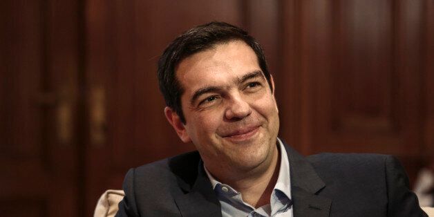Greece's Prime Minister Alexis Tsipras, right, and visiting Cypriot President Nicos Anastasiadis address reporters during a news briefing in Athens, on Friday, April 17, 2015. Anastasiadis is on a one-day official visit to Greece. (AP Photo/Yorgos Karahalis)