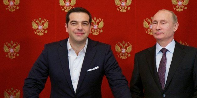 Russian President Vladimir Putin, right, and Greek Prime Minister Alexis Tsipras attend a signing ceremony in the Kremlin in Moscow, Russia, Wednesday, April 8, 2015. Russian President Vladimir Putin said the leader of Greece did not ask for financial aid during an official visit, easing speculation that Athens might use its relations with Moscow to gain advantage in bailout talks with European creditors. (AP Photo/Alexander Zemlianichenko, pool)