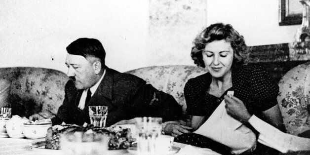 Our undated picture shows the German Fuehrer Adolf Hitler and his mistress Eva Braun while dining. (AP-Photo/Eva Braun's Album/HO)