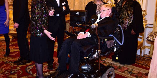 LONDON, ENGLAND - MARCH 10: Princess Anne, Princess Royal and Professor Stephen Hawking talk as they attend a reception and dinner in support of Motor Neurone Disease Association at Buckingham Palace on March 10, 2015 in London, United Kingdom. (Photo by Ian West - WPA Pool/Getty Images)