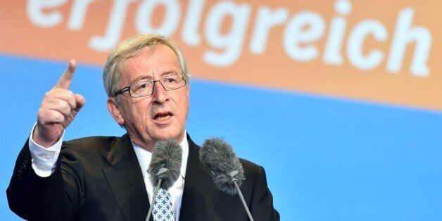 The Christian Democratic frontrunner Jean-Claude Junker speaks during an election campaign event for the European election on 25 May 2014 in Worms, Germany, 24 May 2014. Letters in background read