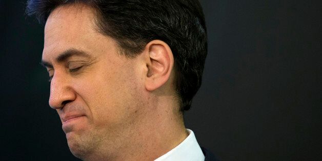 Labour Party leader Ed Miliband waits to speak after holding his seat as results are announced in Britain's general election, in Doncaster, England, Friday May 8, 2015. The Conservative Party fared much better than expected in Britain's parliamentary election, with an exit poll and early returns suggesting that Prime Minister David Cameron would remain in his office at 10 Downing Street. The opposition Labour Party took a beating, according to the exit poll, much of it due to the rise of the separatist Scottish National Party. (AP Photo/Jon Super)
