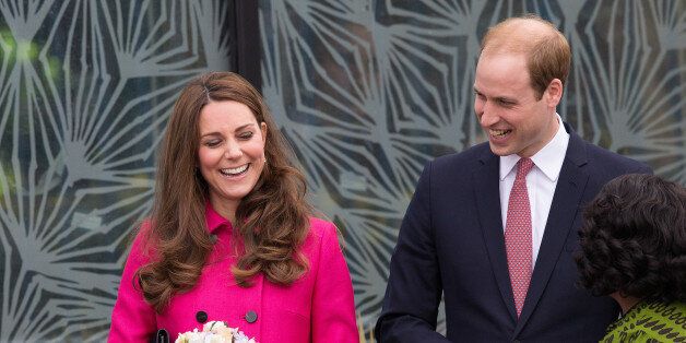 Britain's Prince William and Britain's Kate, Duchess of Cambridge smile as they as they leave the Stephen Lawrence Centre following a tour of the facility where they met staff in Deptford, London, Friday, March 27, 2015. The Duchess is expecting her second child in April. (AP Photo/Tim Ireland)