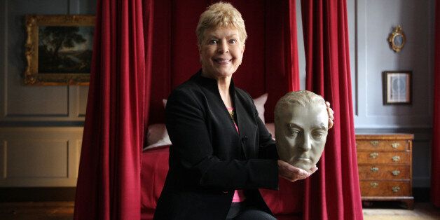 LONDON, ENGLAND - APRIL 07: Ruth Rendell, crime novelist and patron of the Handel House Museum, holds a life mask of George Frideric Handel, in the room where the composer died 250 years ago, on April 7, 2009 in London, England. The mask of Handel, by Roubiliac and dating from the 1740s, is being used to promote the Handel House Museum's marking of his death on April 14, 1759. During his life Handel lived for 36 years in the Georgian building on Brook Street, London which now houses a museum in his honor. (Photo by Oli Scarff/Getty Images)