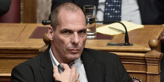 Greek Finance Minister Yanis Varoufakis attends a parliament session in Athens on March 30, 2015. The EU warned Monday that Greece and its creditors had yet to hammer out a new list of reforms despite talks lasting all weekend aimed at staving off bankruptcy and a euro exit. AFP PHOTO / ARIS MESSINIS (Photo credit should read ARIS MESSINIS/AFP/Getty Images)