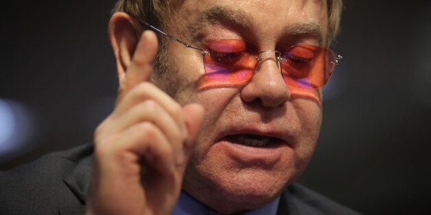 WASHINGTON, DC - MAY 06: Singer/songwriter Elton John speaks during a hearing before the State, Foreign Operations and Related Programs Subcommittee of the Senate Appropriations Committee May 6, 2015 on Capitol Hill in Washington, DC. The subcommittee held the hearing on global health problems. (Photo by Alex Wong/Getty Images)