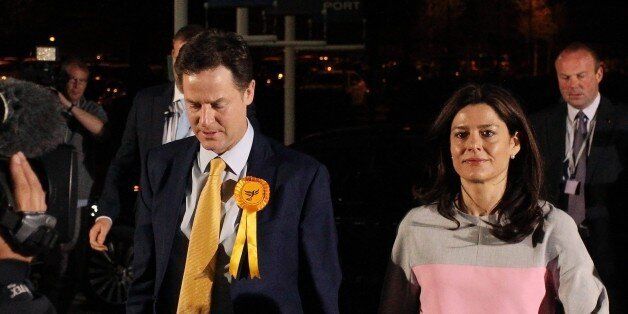 Leader of the Liberal Democrat Party Nick Clegg his wife Miriam Gonzalez Durantez (R) arrive at a vote counting centre in Sheffield, northern England, on May 8, 2015 before the declaration in the UK general election. Liberal Democrat leader Nick Clegg held his seat in Britain's election even as his party suffered humiliation nationwide after five years as partner to Prime Minister David Cameron's Conservatives. AFP PHOTO / LINDSEY PARNABY (Photo credit should read LINDSEY PARNABY/AFP/Getty Images)