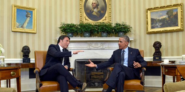 President Barack Obama reaches to shake hands with Italian Prime Minister Matteo Renzi in the Oval Office of the White House in Washington, Friday, April 17, 2015. The leaders are expected to discuss Europe's economy, a pending trade pact between the U.S. and Europe, climate change and energy security. (AP Photo/Susan Walsh)