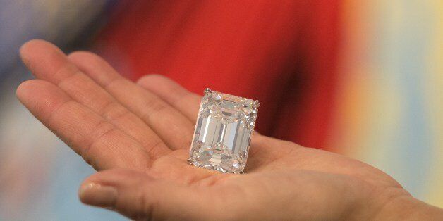 A 100.20 carat flawless diamond is displayed at a media preview for Sotheby's Spring Art Auction on March 25, 2015, in Beverly Hills, California. The 100.20 carat, emerald-cut, D color, internally flawless, type IIa diamond, is estimated to be worth between USD 19 and 25 million dollars. The auction will take place April 21, 2015 in New York. AFP PHOTO / ROBYN BECK (Photo credit should read ROBYN BECK/AFP/Getty Images)