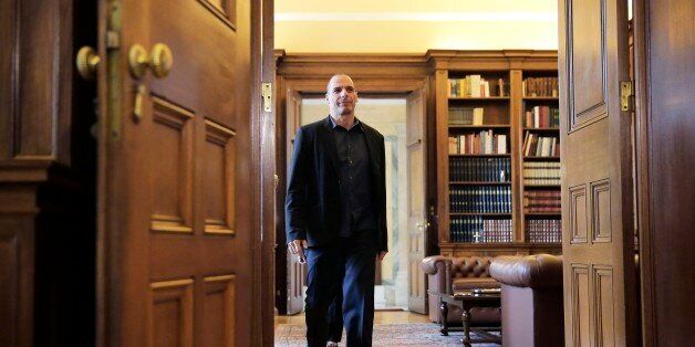 Greek Finance Minister Yanis Varoufakis arrives for a meeting with Greek President Prokopis Pavlopoulos in Athens, on Tuesday, March 24, 2015. Varoufakis visited Greek President to discuss economic developments.(AP Photo/Petros Giannakouris)