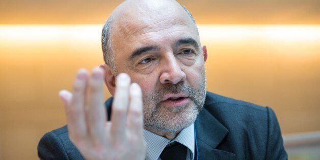 European Commissioner for Economic and Financial Affairs Pierre Moscovici speaks during an interview with AFP at the IMF/WB Spring Meetings in Washington, DC, on April 16, 2015. AFP PHOTO/NICHOLAS KAMM (Photo credit should read NICHOLAS KAMM/AFP/Getty Images)