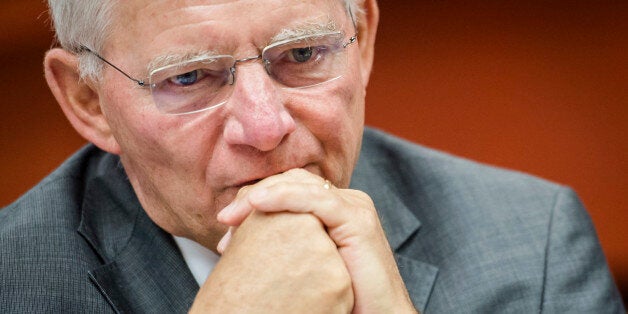 German Finance Minister Wolfgang Schauble arrives for a EU finance ministers meeting at the European Council building in Brussels, Tuesday, July 8, 2014. (AP Photo/Geert Vanden Wijngaert)