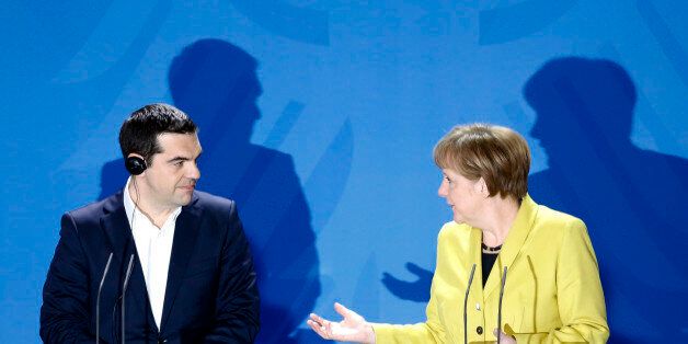 RECROP OF MSC118 German Chancellor Angela Merkel, right, and the Prime Minister of Greece Alexis Tsipras brief the media during a bilateral meeting at the chancellery in Berlin, Monday, March 23, 2015. (AP Photo/Markus Schreiber)