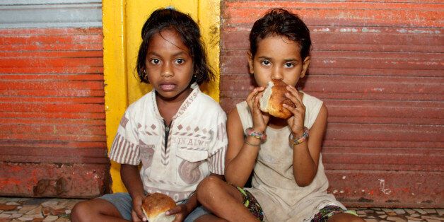 These are the children of Goa's migrant workers. Janine Gaiddon from France comes to Colva in South Goa for five months every year to help the children. She gives over a hundred a day breakfast, provides basic first aid and helps those who go to school remain by donating uniforms, stationery and giving them lunch. She is a truly amazing lady. She is funded by a small charity, Terre d'Espoir, which she and her late husband set up in their home town in Brittany.Voici les enfants des ouvriers migra