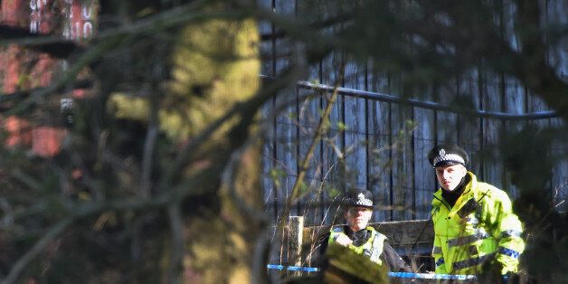 MILNGAVIE, SCOTLAND - APRIL 16: Police at the scene near High Craigton Farm on the outskirts of Milngavie, north of Glasgow, which has been cordoned off following the discovery of human remains yesterday, on April 16, 2015 in north Glasgow, Scotland. Police have arrested a 21-year-old man in connection with the disappearance of 24-year-old Irish student, Karen Buckley, who was last seen leaving a Glasgow nightclub in the early hours of Sunday morning. After leaving she reportedly travelled in a car to a flat about two miles from the club. (Photo by Jeff J Mitchell/Getty Images)