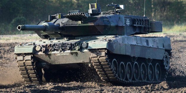 A Leopard 2 tank is pictured during a demonstration event held for the media by the German Bundeswehr in Munster near Hannover, Germany, Wednesday, Sept. 28, 2011. (AP Photo/Michael Sohn)