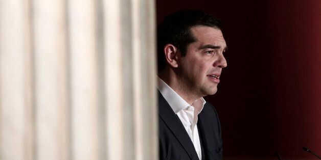 Greece's prime minister Alexis Tsipras delivers a speech at Athens University, Wednesday March 25, 2015. Tsipras' speech took place during a special gathering to commemorate Greece's Independence Day, which marks the start of the uprising against the Ottomans back in 1821. (AP Photo/Panayiotis Tzamaros)