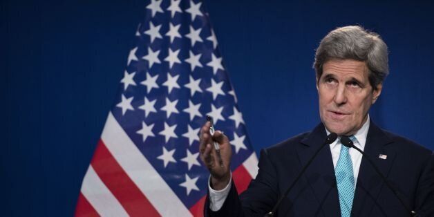 US Secretary of State John Kerry gestures as he speaks to the press at the Swiss Federal Institute of Technology, or Ecole Polytechnique Federale De Lausanne, in Lausanne, Switzerland, Thursday, April 2, 2015, after Iran nuclear program talks finished with extended sessions. The United States, Iran and five other world powers on Thursday announced an understanding outlining limits on Iran's nuclear program so it cannot lead to atomic weapons, directing negotiators toward achieving a comprehensive agreement within three months. (AP Photo/Brendan Smialowski, Pool)