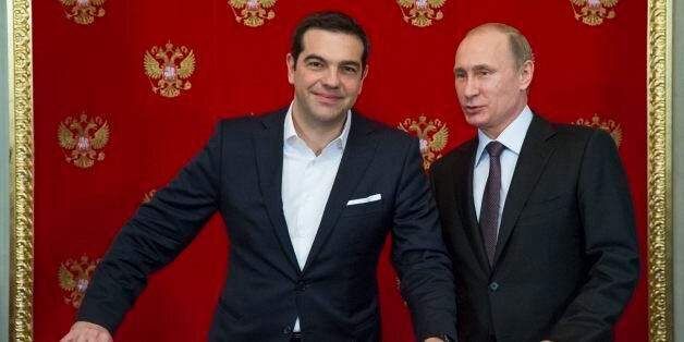 Russian President Vladimir Putin, right, and Greek Prime Minister Alexis Tsipras attend a signing ceremony in the Kremlin in Moscow, Russia, Wednesday, April 8, 2015. Russian President Vladimir Putin said the leader of Greece did not ask for financial aid during an official visit, easing speculation that Athens might use its relations with Moscow to gain advantage in bailout talks with European creditors. (AP Photo/Alexander Zemlianichenko, pool)