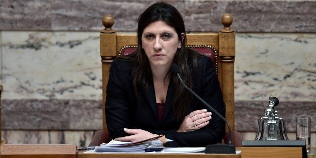 The president of the Greek Parliament, Zoi Konstantopoulou, attends on March 18, 2015 a parliament session in Athens. Greece was responding sharply to apparent pressure from the EU not to pass a so-called 'humanitarian crisis' law that would provide free electricity and food stamps for the poorest households. AFP PHOTO / ARIS MESSINIS (Photo credit should read ARIS MESSINIS/AFP/Getty Images)