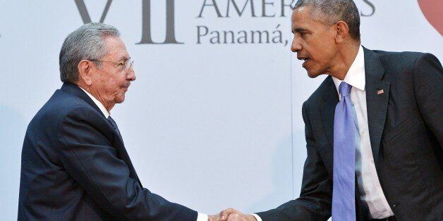 US President Barack Obama (R) shakes hands with Cuba's President Raul Castro during a meeting on the sidelines of the Summit of the Americas at the ATLAPA Convention center on April 11, 2015 in Panama City. AFP PHOTO/MANDEL NGAN (Photo credit should read MANDEL NGAN/AFP/Getty Images)