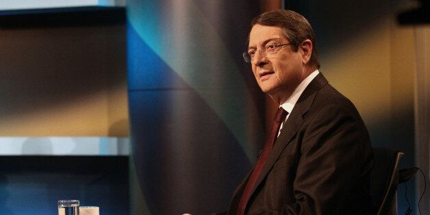 Nikos Anastasiadis, one of the two remaining candidates in the Cypriot presidential election, attends the last televised political debate in Nicosia, on February 22, 2013 ahead of the scheduled elections on February 24. AFP PHOTO / YIANNIS KOURTOGLOU (Photo credit should read Yiannis Kourtoglou/AFP/Getty Images)