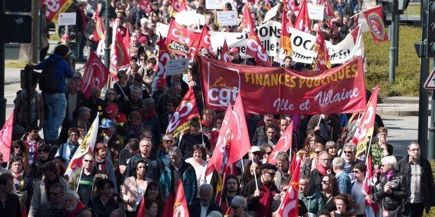 People take part in a demonstration against austerity measures in Rennes, western France on April 9, 2015 as part of a national strike called by French unions CGT, FO, FSU and Union Syndicale Solidaires. AFP PHOTO / DAMIEN MEYER (Photo credit should read DAMIEN MEYER/AFP/Getty Images)