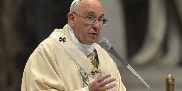 Pope Francis leads a mass for Armenian Catholics marking 100 years since the mass killings of Armenians under the Ottoman Empire, on April 12, 2015 at St Peter's basilica in Vatican. Pope Francis faces a key diplomatic test today as he marks the centenary of the mass killings of Armenians and elects whether to use the word 'genocide', at the risk of alienating Turkey. AFP PHOTO / ANDREAS SOLARO (Photo credit should read ANDREAS SOLARO/AFP/Getty Images)