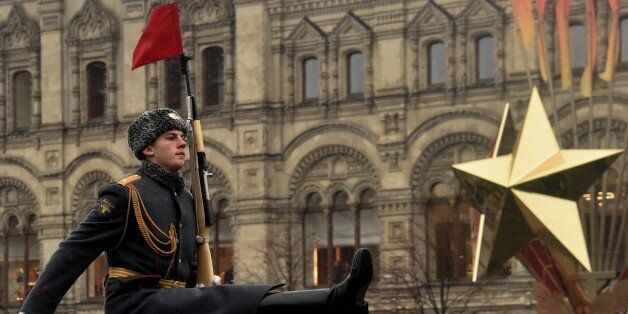 Wearing World War II-era uniform of the Red Army troops, Russian soldiers take part in the military parade on the Red Square in Moscow on November 7, 2014. Russia marked today the 73d anniversary of the 1941 historical parade, when the Red Army soldiers marched to the front line from the Red Square, as Nazi German troops were just a few kilometers from Moscow. AFP PHOTO/KIRILL KUDRYAVTSEV (Photo credit should read KIRILL KUDRYAVTSEV/AFP/Getty Images)