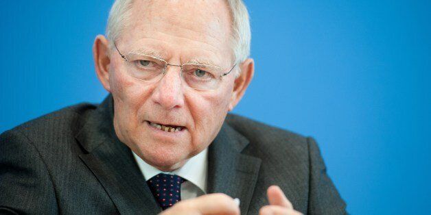 German Finance Minister Wolfgang Schaeuble gestures during a news conference at the Haus der Bundespressekonferenz in Berlin on March 18, 2015. Schaeuble and Vice Chancellor and Economic Minister Sigmar Gabriel commented the Federal budget plan for 2016 and the Financial Planning for 2019. AFP PHOTO / STEFFI LOOS (Photo credit should read STEFFI LOOS/AFP/Getty Images)