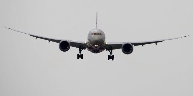 AN Air India Boeing 787 Dreamliner performs its demonstration flight during the 50th Paris Air Show at Le Bourget airport, north of Paris, Wednesday, June 19, 2013. (AP Photo/Francois Mori)