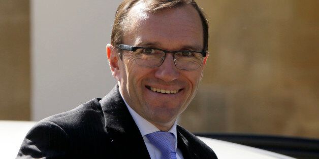 United Nations envoy for Cyprus, Norwayâs Espen Barth Eide smiles to the media as arrives at the presidential palace for a meeting with Cyprus' president Nicos Anastasiades in Nicosia, Tuesday, April 7, 2015. Halted negotiations to reunify ethnically divided Cyprus will resume next month after a clash over rights to the islandâs potential offshore gas riches that triggered the talks break has subsided, a United Nations envoy said. (AP Photo/Petros Karadjias)