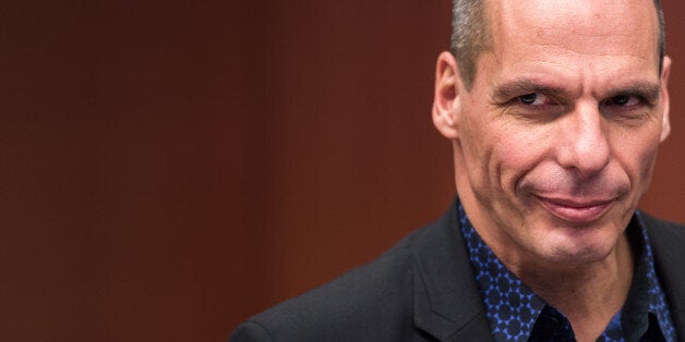 Greek Finance Minister Yanis Varoufakis arrives for a meeting of eurogroup finance ministers at the European Council building in Brussels, Monday March 9, 2015. (AP Photo/Geert Vanden Wijngaert)