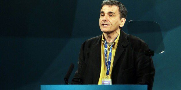 Guest speaker Euclid Tsakalotos of Greek Syriza party addresses the Republican party Sinn Fein annual conference in Londonderry, Northern Ireland on March 7, 2015. AFP PHOTO / PAUL FAITH (Photo credit should read PAUL FAITH/AFP/Getty Images)