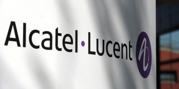 A picture taken in front of one site of Franco-US Telecommunications equipment group Alcatel-Lucent shows the company's logo in Boulogne-Billancourt near Paris on April 14, 2015. Finnish telecoms equipment maker Nokia said Tuesday it was in talks to purchase all of its Franco-American rival Alcatel-Lucent, with the aim of creating a telecoms and Internet technology behemoth. AFP PHOTO ERIC PIERMONT (Photo credit should read ERIC PIERMONT/AFP/Getty Images)