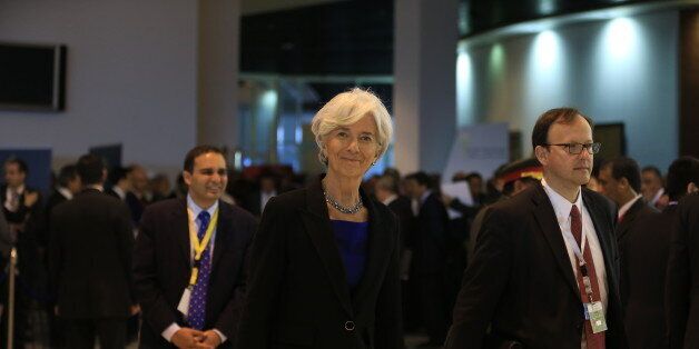 Christine Lagarde, Managing Director of the International Monetary Fund arrives at an economic conference seeking billions of dollars in investment that brings together hundreds of business executives and foreign leaders, in Sharm el-Sheikh, Egypt, Friday, March 13, 2015. The conference is the government's centerpiece for showing that the country is ready for business. Egyptian President Abdel-Fattah el-Sissi has staked much of his legitimacy on fixing an economy deeply damaged by four years of