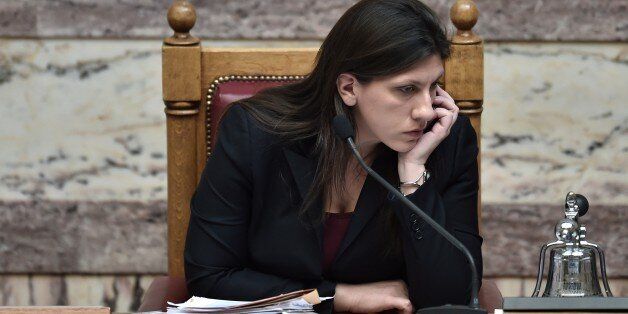 The president of the Greek Parliament, Zoi Konstantopoulou, attends on March 18, 2015 a parliament session in Athens. Greece was responding sharply to apparent pressure from the EU not to pass a so-called 'humanitarian crisis' law that would provide free electricity and food stamps for the poorest households. AFP PHOTO / ARIS MESSINIS (Photo credit should read ARIS MESSINIS/AFP/Getty Images)