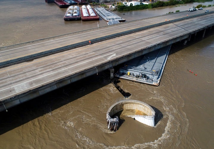 Interstate 10 at the San Jacinto River was shut down in both directions after multiple barges collided with the bridge Friday, Sept. 20, 2019, in Houston, in the aftermath of Tropical Storm Imelda. 