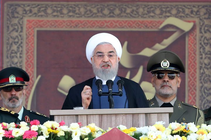 Iranian President Hassan Rouhani speaks during a military parade marking the 39th anniversary of the outset of the Iran-Iraq war.