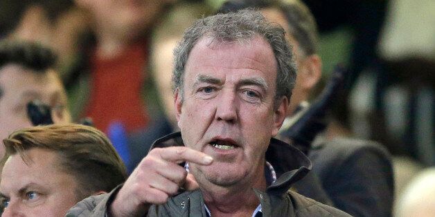 FILE - In this Wednesday, March 11, 2015 file photo, TV host Jeremy Clarkson gestures as he takes his place in the stands before the Champions League round of 16 second leg soccer match between Chelsea and Paris Saint Germain at Stamford Bridge Stadium in London. A television station owned by the Russian defense ministry is offering a job to former