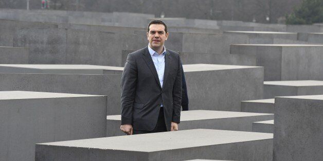 Greek Prime Minister Alexis Tsipras visits the Memorial to the Murdered Jews of Europe aka Holocaust Memorial in Berlin on March 24, 2015. Tspiras is making his first visit to the German capital since taking office in January 2015. AFP PHOTO / TOBIAS SCHWARZ (Photo credit should read TOBIAS SCHWARZ/AFP/Getty Images)