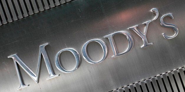 FILE - This Aug. 24, 2010 file photo, shows the signage for Moody's Corp., in New York. Moody's Investors Service is a credit rating agency. (AP Photo/Mark Lennihan, File)