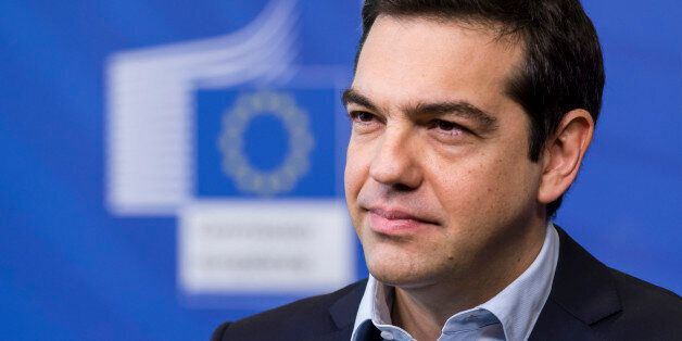 Greece's Prime Minister Alexis Tsipras addresses the media at the European Commission headquarters in Brussels Friday, March 13, 2015. (AP Photo/Geert Vanden Wijngaert)