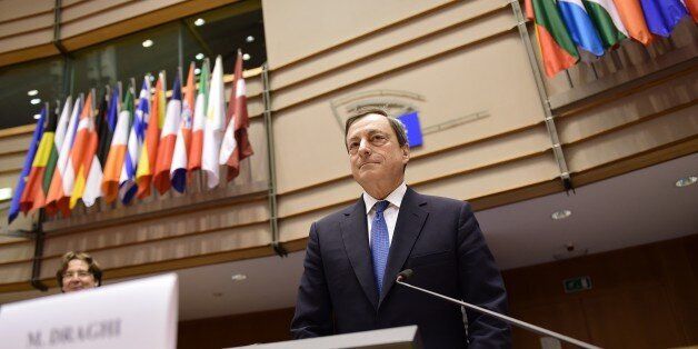European Central Bank President Mario Draghi arrives to deliver introductory remarks in front of the Economic and Monetary Affairs Committee at the European Parliament, in Brussels, on March 23, 2015. AFP PHOTO / EMMANUEL DUNAND (Photo credit should read EMMANUEL DUNAND/AFP/Getty Images)
