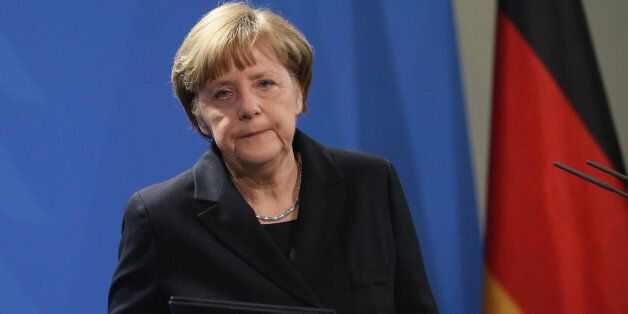 BERLIN, GERMANY - MARCH 26: German Chancellor Angela Merkel departs after giving a statement to the media following the revelation by French authorities that the co-pilot of Germanwings flight 4U9525 was inside the locked cockpit of the plane during its final descent and crash two days ago on March 26, 2015 in Berlin, Germany. According to authorities the co-pilot, identified as Andreas Lubitz, had to have initiated the plane's rapid descent and refused entry to the cockpit to the pilot, who was locked on the other side of the door. Police are now investiagting the possibility that Lubitz steered the plane to its destruction, and with it causing the deaths of all 150 people on board, deliberately. (Photo by Sean Gallup/Getty Images)