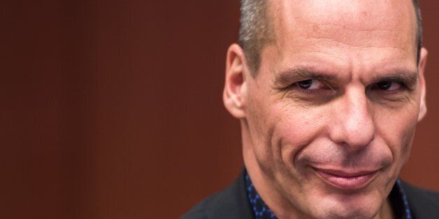 Greek Finance Minister Yanis Varoufakis arrives for a meeting of eurogroup finance ministers at the European Council building in Brussels, Monday March 9, 2015. (AP Photo/Geert Vanden Wijngaert)