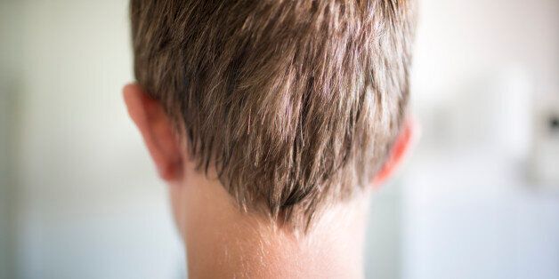 DUELMEN, GERMANY - AUGUST 12: Back of the head of a fourteen-year-old boy on August 12, 2014, in Duelmen, Germany. Photo by Ute Grabowsky/Photothek via Getty Images)***Local Caption***