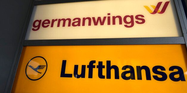 A Germanwings logo is pictured at the airport in Dusseldorf, Germany, Tuesday, March 24, 2015. A Germanwings passenger jet carrying 150 people crashed in the French Alps region as it traveled from Barcelona to Duesseldorf. Germanwings is a division of German airline Lufthansa. (AP Photo/Martin Meissner)